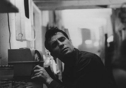 Mr. Kerouac listening to the radio.
